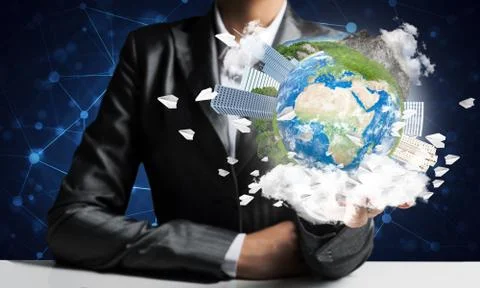 Businessman presenting Earth globe. Stock Photos