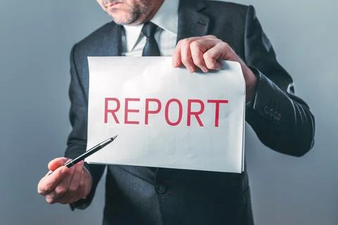 Businessman presenting Report document, symbolizing data review, reporting,.. Stock Photos