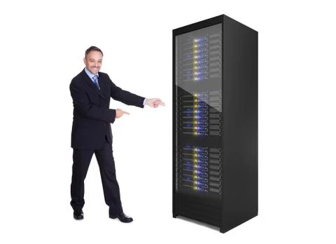 Businessman presenting server rack Stock Photos