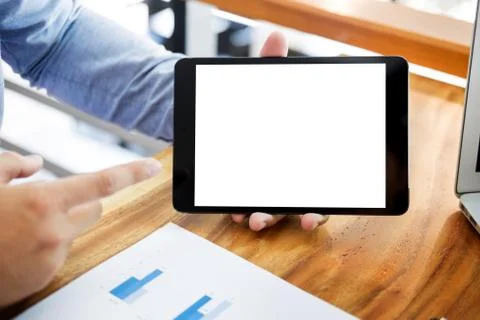 Businessman presenting something at the seminar using tablet at the office , Foto stock