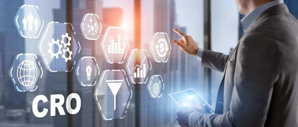 Businessman presses Conversion Rate Optimization On Virtual Screen. Stock Photos