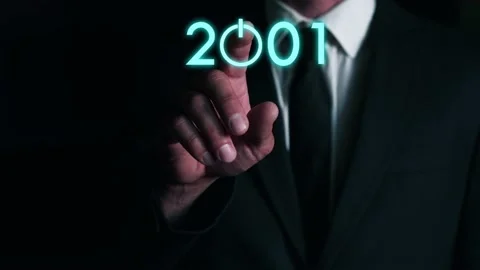 Businessman presses on the virtual start button to load the date of the new y Stock Footage 161118551