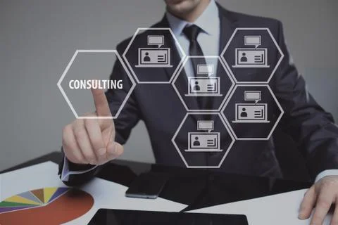 Businessman pressing button on touch screen interface and select Consulting Stock Photos