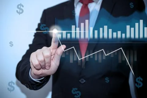 Businessman pressing button on virtual screen with diagram and cash concept Stock Photos