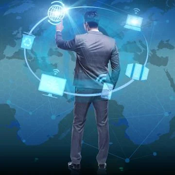 Businessman pressing buttons in computing concept 写真素材