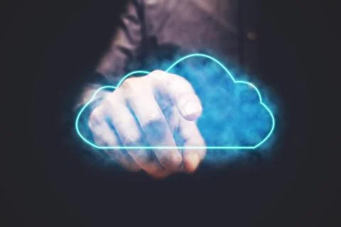 Businessman pressing cloud computing icon with vitual screen. Stock Photos