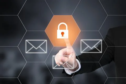 Businessman pressing e-mail security button on virtual screens. Use for busin Stock Photos