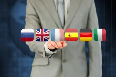 Businessman pressing French flag Stock Photos