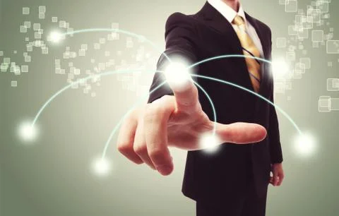 Businessman pressing technology button Stock Photos