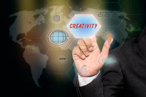 Businessman pressing touch screen interface and select "CREATIVITY". Stock Illustration