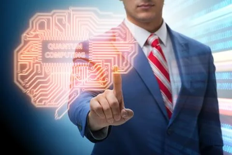 Businessman pressing virtual button in quantum computing concept Stock Photos