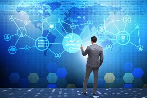 Businessman pressing virtual button in quantum computing concept 库存照片