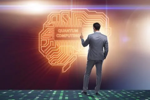 Businessman pressing virtual button in quantum computing concept Stock Photos