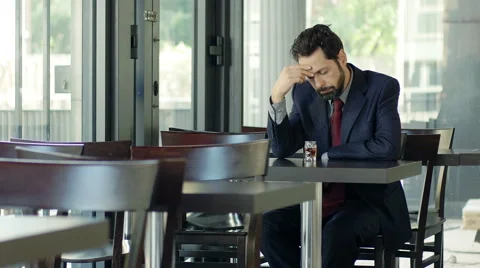 Businessman with problems drinking alcohol: tired, depressed, lonely Stock Footage 48750820