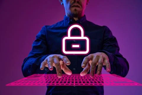 Businessman, programmer typing on virtual, digital keyboard with padlock symbol Stock-Fotos