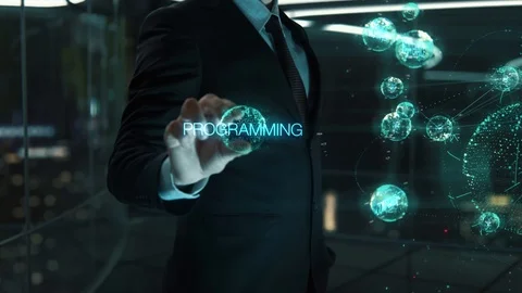 Businessman with Programming hologram concept Stock Footage 118551153