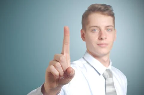Businessman pushing imaginary button Stock Illustration