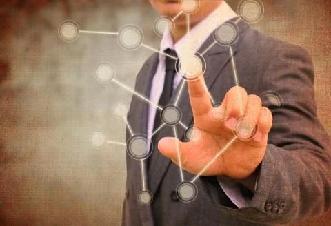 Businessman pushing a touch screen interface in the old paper Stock Illustration