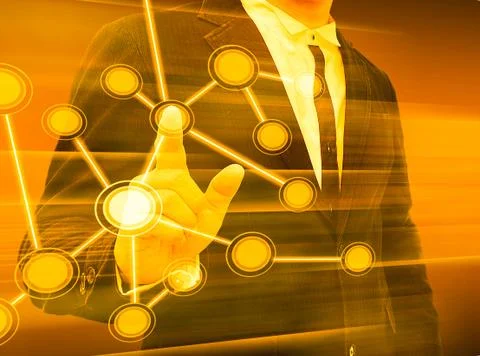 Businessman pushing a touch screen interface Stock Photos