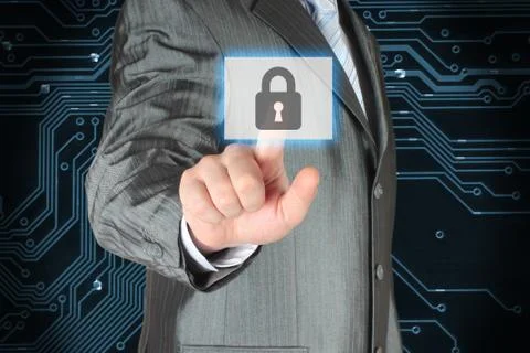 Businessman pushing virtual security button. Stock Photos
