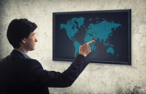 Businessman pushing world map interface Stock Illustration