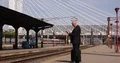 Businessman in Railway Station Text Using Electronic Tablet Waiting Train 4k or 4k+ Resolution