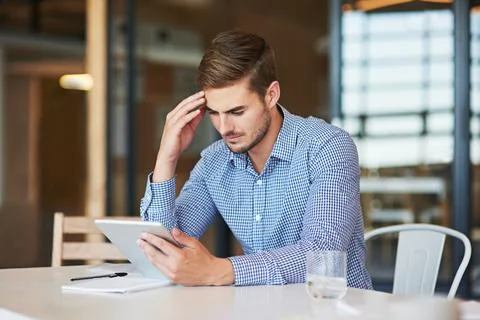 Businessman, reading and problem solving in office with tablet for marketin.. Stock Photos
