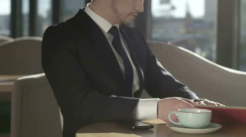 Businessman Reading a Book Stock-Footage 63305967