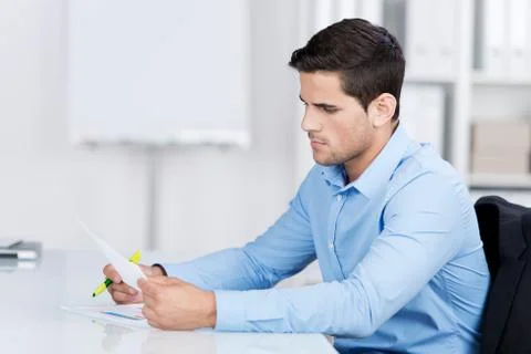 Businessman reading a document 写真素材