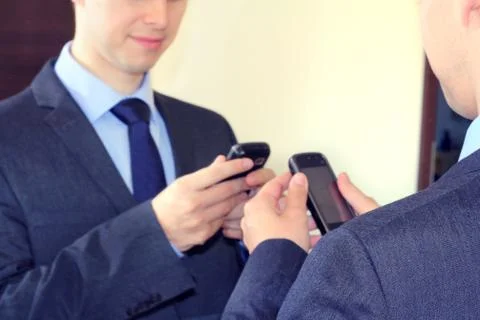 Businessman reading text message Stock Photos