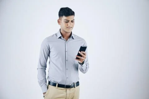 Businessman reading text message Stock Photos