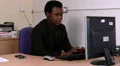 Businessman reads a message and smiles HD Footage