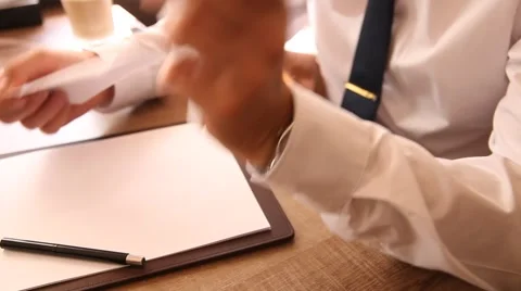 Businessman received empty sheet of paper and teared it Stock Footage 54690231