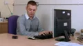 Businessman receives good news text message HD Footage