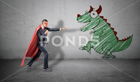 A businessman in a red cape standing in fighting pose ready to fight a picture Stock Photos