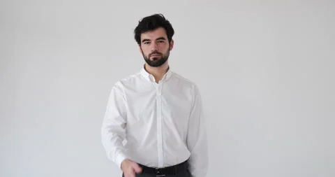 Businessman regretting his wrongdoing over white Stock Footage 133007352