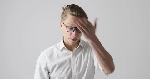 Businessman regretting wrongdoing of someone Stock Footage 121227946