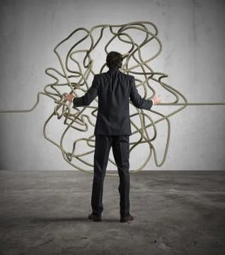 Businessman resolves the tangle 스톡 사진