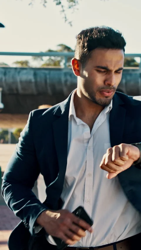 Businessman, running or checking watch in city for late trip, deadline or Stock Footage 340383992