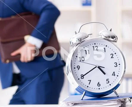 Businessman in rush trying to meet deadline Stock Photos