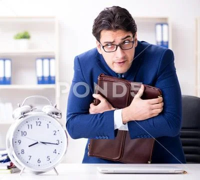 Businessman in rush trying to meet deadline Stock Photos