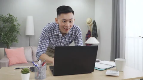 Businessman rushing over to check on the computer Video stock 163893103