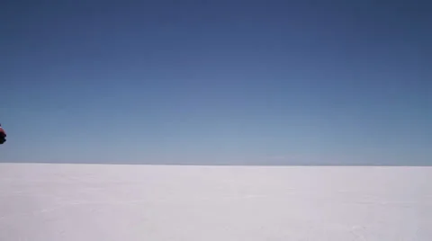 Businessman at salt flat looking through binoculars Stock-Footage 62281859