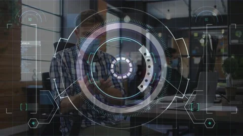 Businessman sanitizing at desk with frames progressing, circular HUD expanding, Stock Footage 330959678