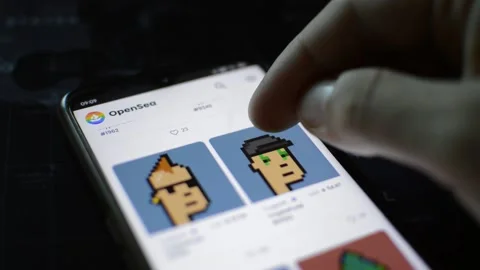 Businessman scroll cryptopunk nft collection on his phone. non fungible token Video stock 197127217