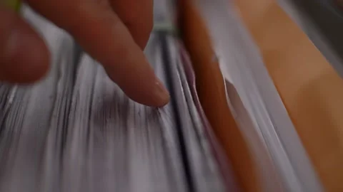 Businessman scroll paper document folder for work on his office. Stock Footage 231689626