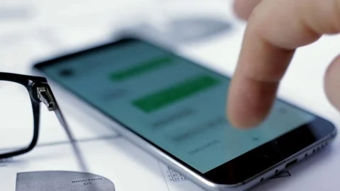 Businessman scrolling sms Stock Footage 72471623