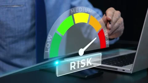 Businessman selecting high risk management level on a virtual scale 库存影片 339785662