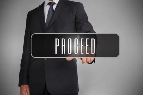 Businessman selecting label with proceed written on it Stock Photos