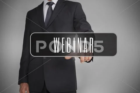 Businessman selecting label with webinar written on it Stock Photos